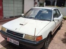 Mazda Familia 323 1990 Car