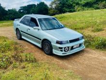 Mazda Familia BJ3P 1990 Car