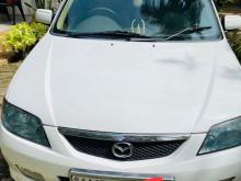 Mazda Familia 2002 Car