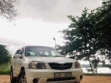 https://riyasewana.com/uploads/mazda-tribute-1610045522011.jpg