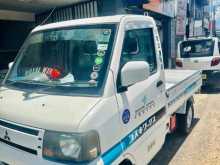 Mitsubishi 2007 Mitsubishi 2002 Lorry