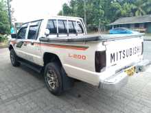 https://riyasewana.com/uploads/mitsubishi-l200-1998-1417350812054.jpg