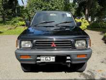 https://riyasewana.com/uploads/mitsubishi-l200-2001-67332612852.jpg