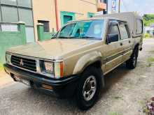 https://riyasewana.com/uploads/mitsubishi-l200-4wd-1993-3022452712602.jpg