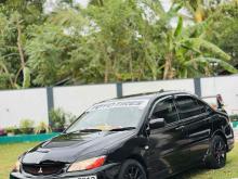 https://riyasewana.com/uploads/mitsubishi-lancar-cs3-1220164824791.jpg