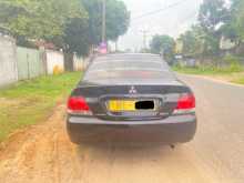 https://riyasewana.com/uploads/mitsubishi-lancer-2003-520445912442.jpg