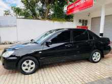 https://riyasewana.com/uploads/mitsubishi-lancer-2004-3011223712444.jpg