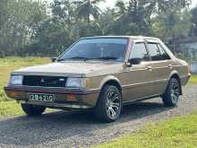 Mitsubishi Lancer Box SL 5FWD 1982 Car