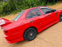 https://riyasewana.com/uploads/mitsubishi-lancer-ck1-1999-121074612203.jpg
