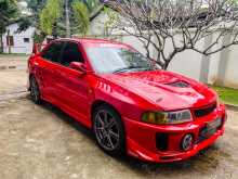 https://riyasewana.com/uploads/mitsubishi-lancer-ck2-1996-2114391612442.jpg