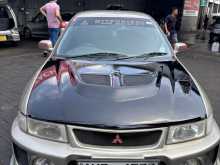 https://riyasewana.com/uploads/mitsubishi-lancer-ck2-2003-2711445512132.jpg
