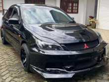 Mitsubishi Lancer CS Turbo 2004 Car