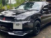 https://riyasewana.com/uploads/mitsubishi-lancer-cs-172032304572.jpg