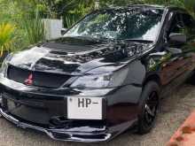 https://riyasewana.com/uploads/mitsubishi-lancer-cs-24916494892.jpg