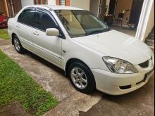 https://riyasewana.com/uploads/mitsubishi-lancer-cs1-110393417016.jpg