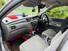 https://riyasewana.com/uploads/mitsubishi-lancer-cs1-2003-2411543212034.jpg