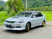 https://riyasewana.com/uploads/mitsubishi-lancer-cs1-2003-2411543212772.jpg