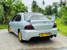 https://riyasewana.com/uploads/mitsubishi-lancer-cs1-2003-2411543212903.jpg
