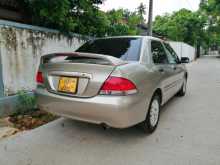 https://riyasewana.com/uploads/mitsubishi-lancer-cs1-2003-2719415212673.jpg