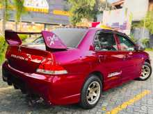https://riyasewana.com/uploads/mitsubishi-lancer-cs1-2003-2814420912134.jpg