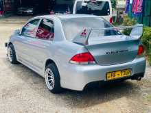 https://riyasewana.com/uploads/mitsubishi-lancer-cs1-2004-2423295812462.jpg
