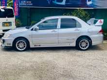 https://riyasewana.com/uploads/mitsubishi-lancer-cs1-2004-2423295812944.jpg