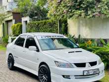 https://riyasewana.com/uploads/mitsubishi-lancer-cs1-2004-99535912571.jpg