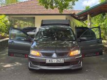 https://riyasewana.com/uploads/mitsubishi-lancer-cs1-2122123124142.jpg