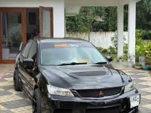 https://riyasewana.com/uploads/mitsubishi-lancer-cs1-2312385824793.jpg