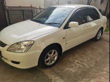 https://riyasewana.com/uploads/mitsubishi-lancer-cs1-46544817716.jpg