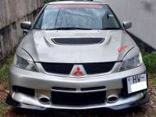 https://riyasewana.com/uploads/mitsubishi-lancer-cs1-9953014043.jpg