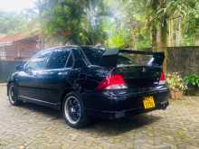 https://riyasewana.com/uploads/mitsubishi-lancer-cs5-2001-268360012532.jpg