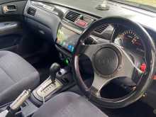 https://riyasewana.com/uploads/mitsubishi-lancer-cs5-2006-2213372112243.jpg