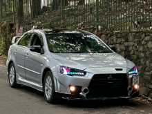 https://riyasewana.com/uploads/mitsubishi-lancer-ex-101041064391.jpg