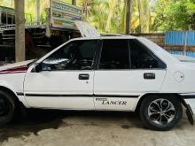 https://riyasewana.com/uploads/mitsubishi-lancer-fiore-215111917105.jpg
