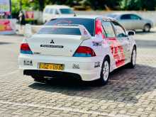 https://riyasewana.com/uploads/mitsubishi-lanser-cs1-2002-156352212542.jpg