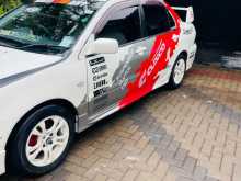 https://riyasewana.com/uploads/mitsubishi-lanser-cs1-2002-56354812474.jpg
