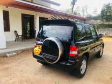 https://riyasewana.com/uploads/mitsubishi-montero-io-2003-2312271612433.jpg