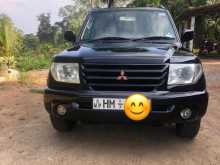 https://riyasewana.com/uploads/mitsubishi-montero-io-2003-2312271612441.jpg