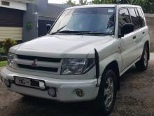 Mitsubishi IO Pajero Montero 2003 SUV