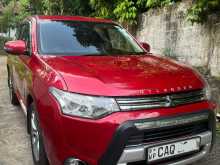 https://riyasewana.com/uploads/mitsubishi-outlander-phev-21120014031.jpg