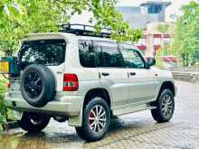 https://riyasewana.com/uploads/mitsubishi-pajero-io-1998-1710123712452.jpg