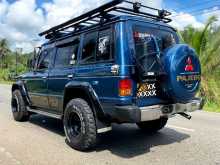 Mitsubishi PAJERO MK1 FlAT Roof Exceed 1985 SUV