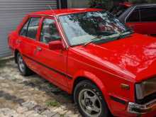 https://riyasewana.com/uploads/nissan-b11-1983-1612382312432.jpg