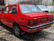 https://riyasewana.com/uploads/nissan-b11-1983-1612382312643.jpg