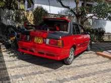 https://riyasewana.com/uploads/nissan-b11-1983-614263412062.jpg