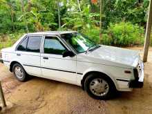 https://riyasewana.com/uploads/nissan-b11-1984-1615310612912.jpg