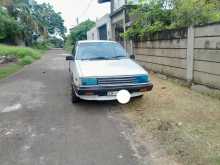 https://riyasewana.com/uploads/nissan-b11-long-1985-1010020212013.jpg