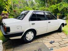 https://riyasewana.com/uploads/nissan-b11-long-1985-86550512054.jpg