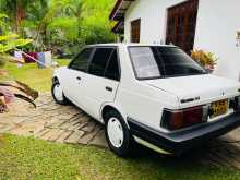 https://riyasewana.com/uploads/nissan-b11-long-1985-86550512663.jpg